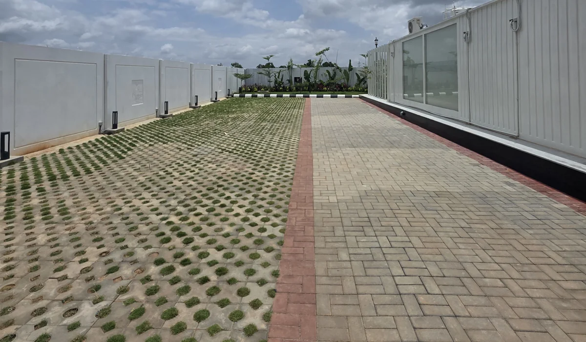 Landscaped visitor parking court with grass pavers at Prestige Springwood, Devanahalli - August 2026